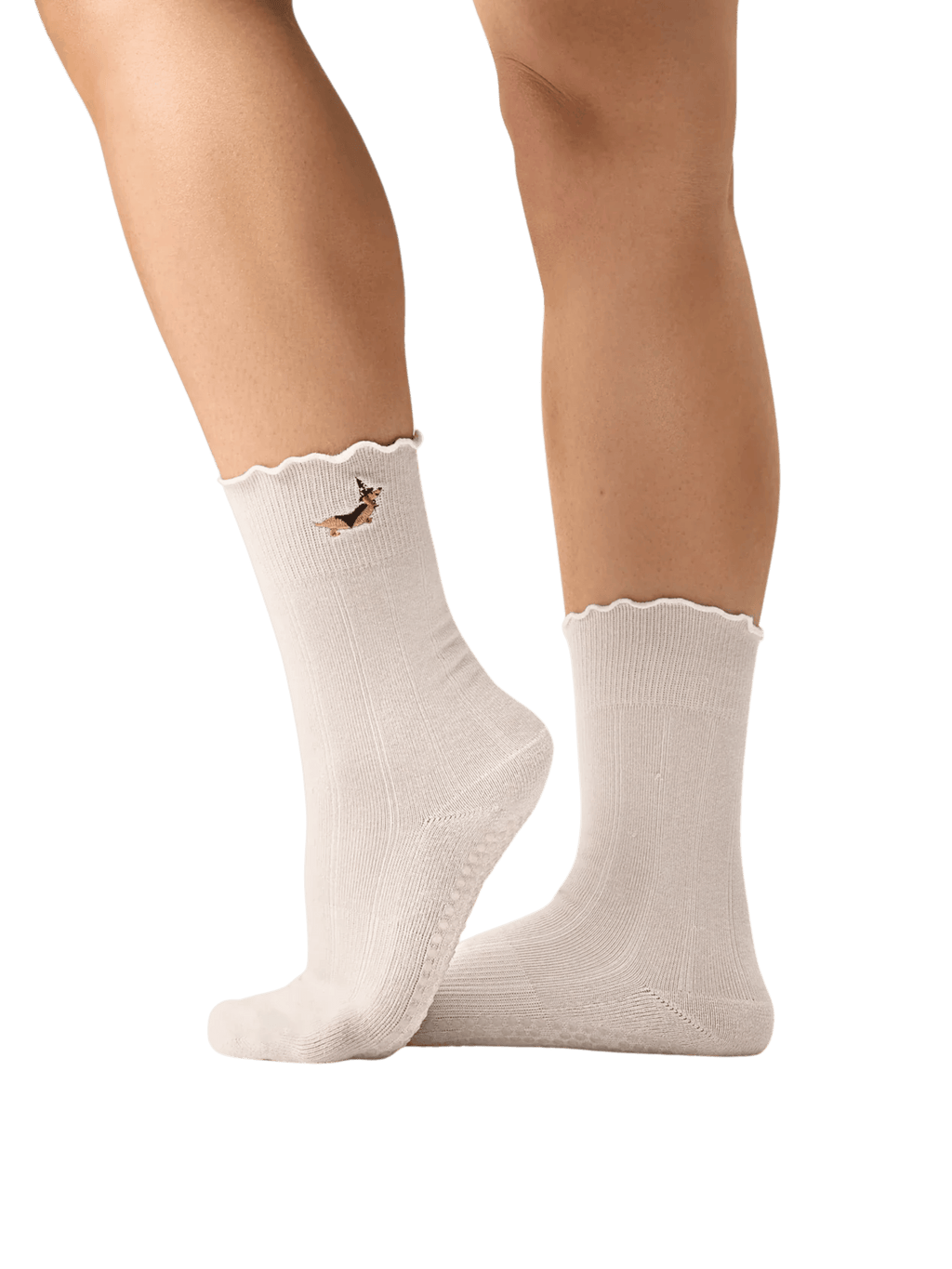 White socks with a small design on the leg against a transparent background