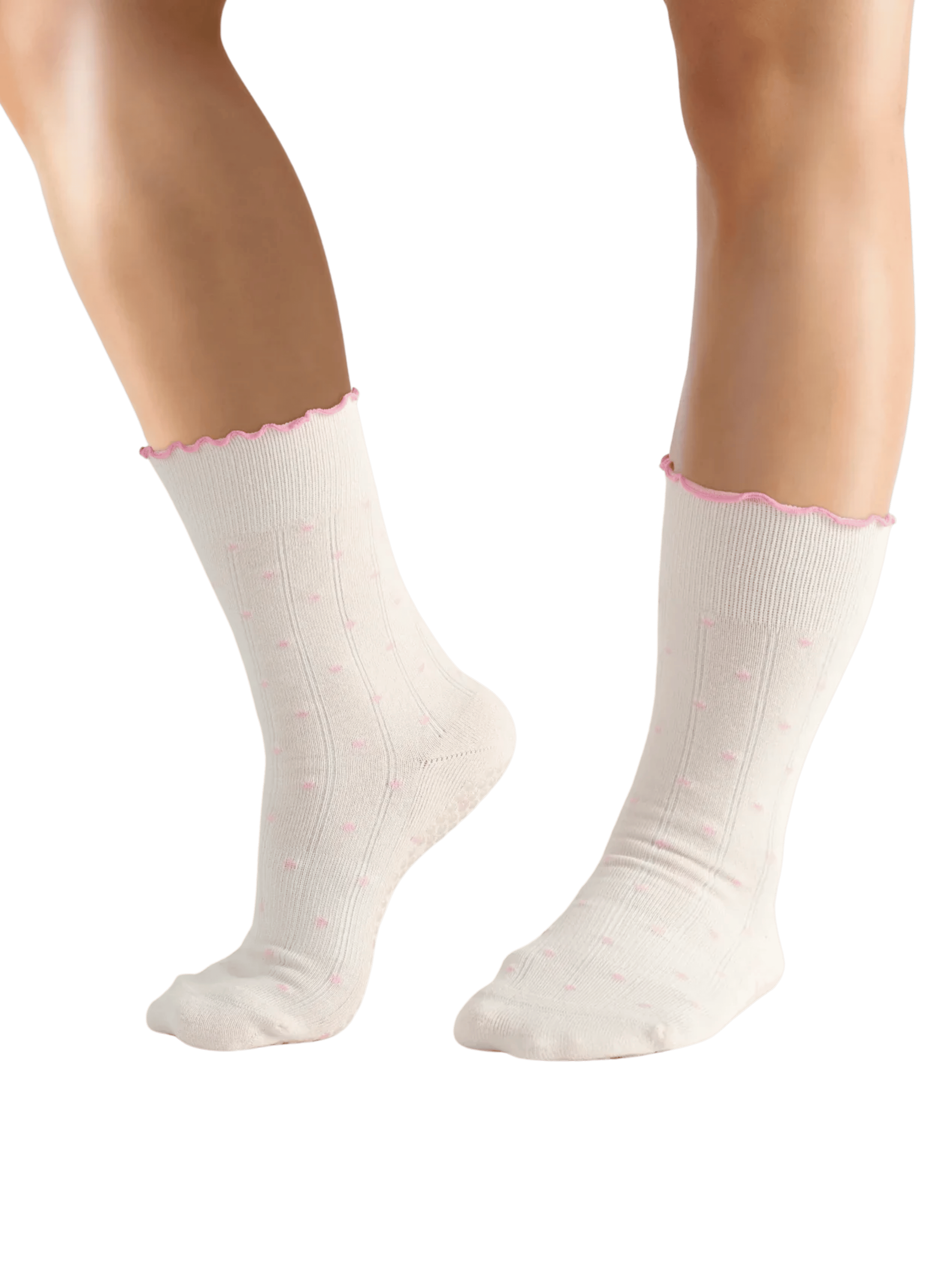 White socks with pink trim worn by a person on a transparent background