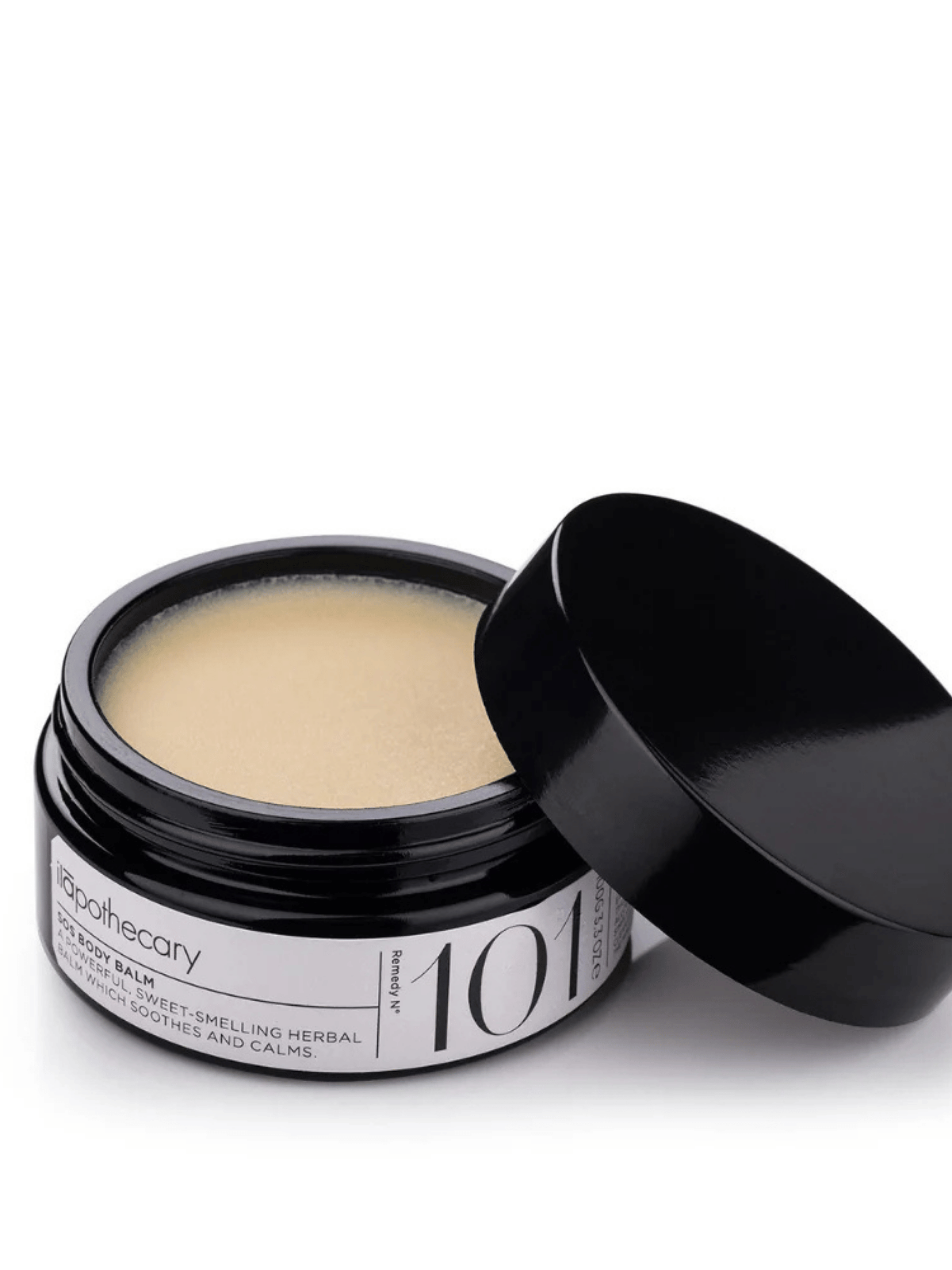 Black jar of balm with a black lid on a white background