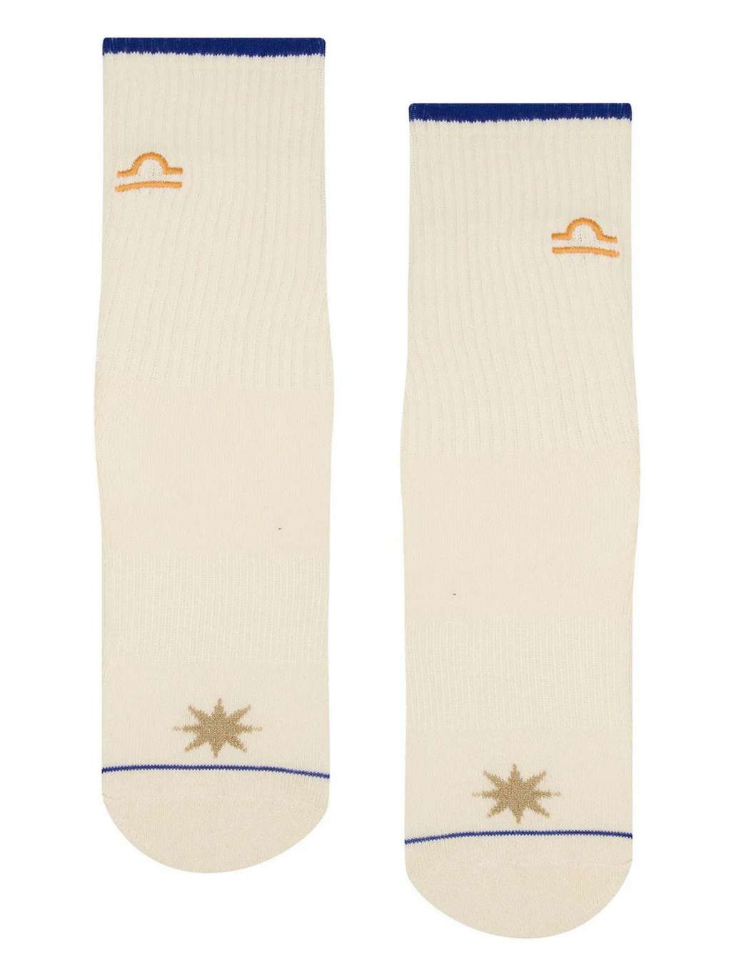 Two cream-colored socks with blue accents and star designs on a white background