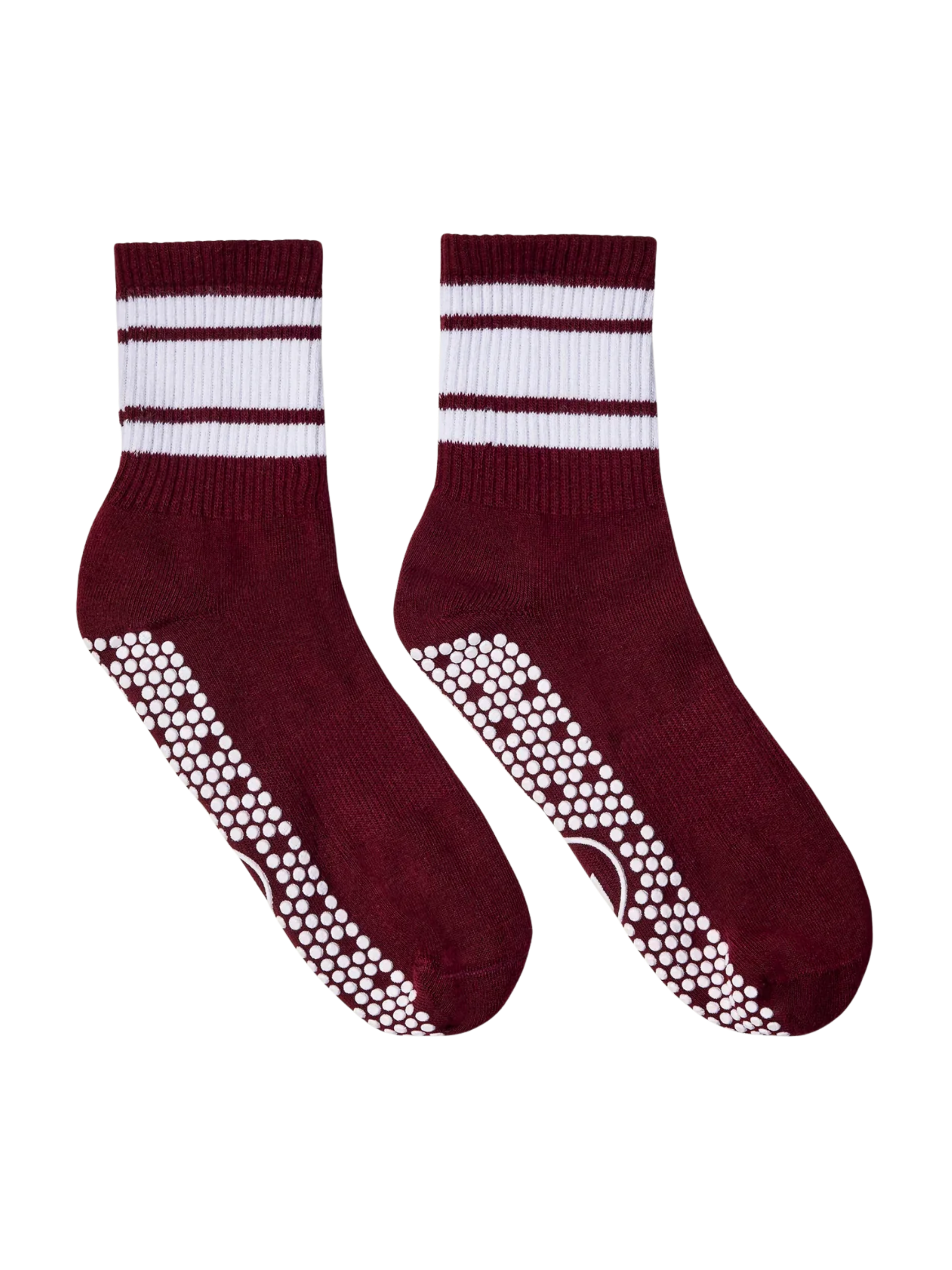 Pair of maroon socks with white stripes and textured sole on a white background