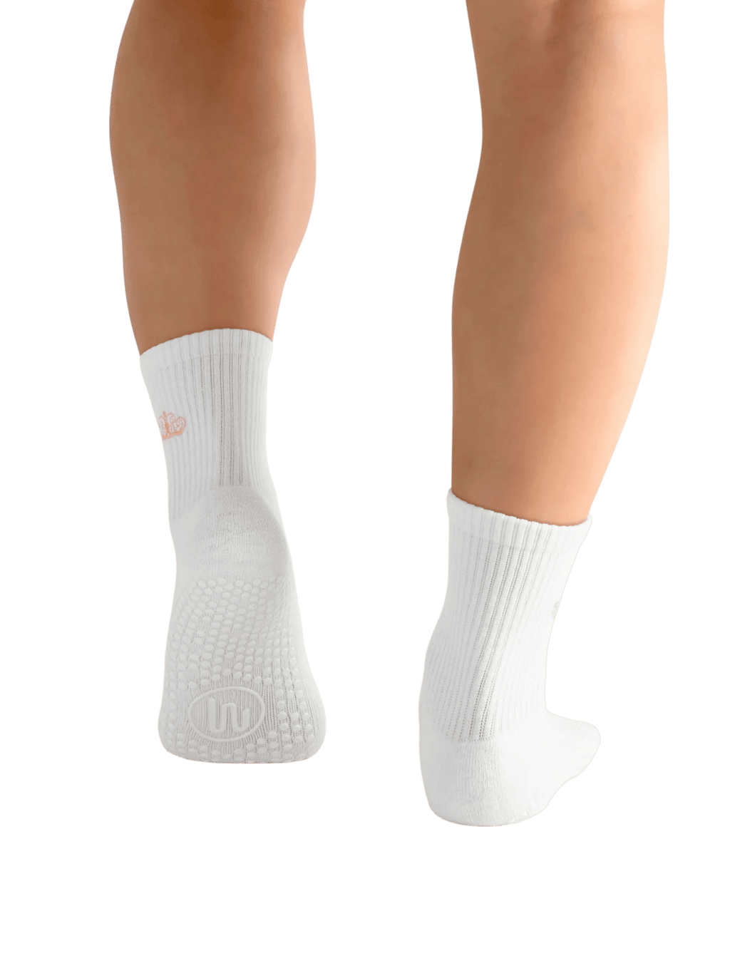 White socks worn on a person's feet with a transparent background