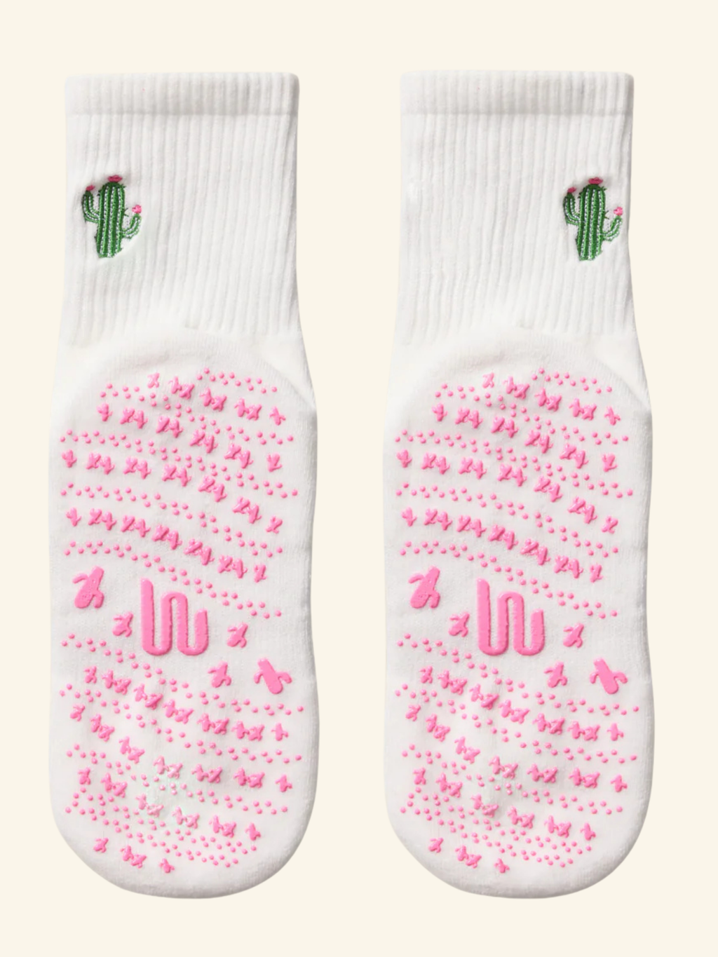 cute Pilates grip socks UK. White socks with pink butterfly pattern and green cactus design on a white background