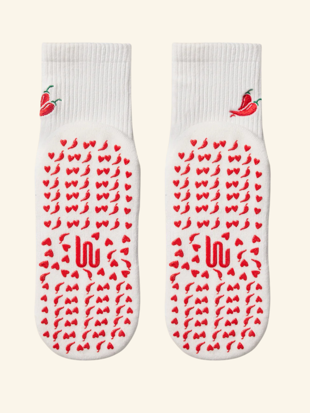 White socks with red chili pepper pattern and brand logo on a white background