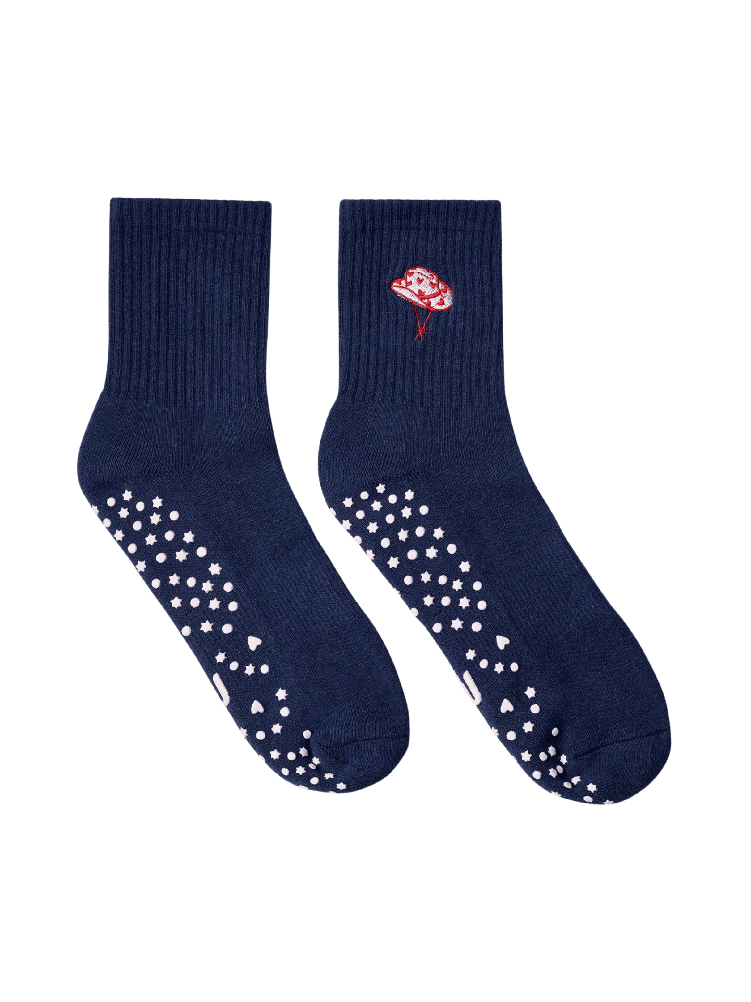 Navy blue socks with white slip-resistant dots and a red flower design on a transparent background
