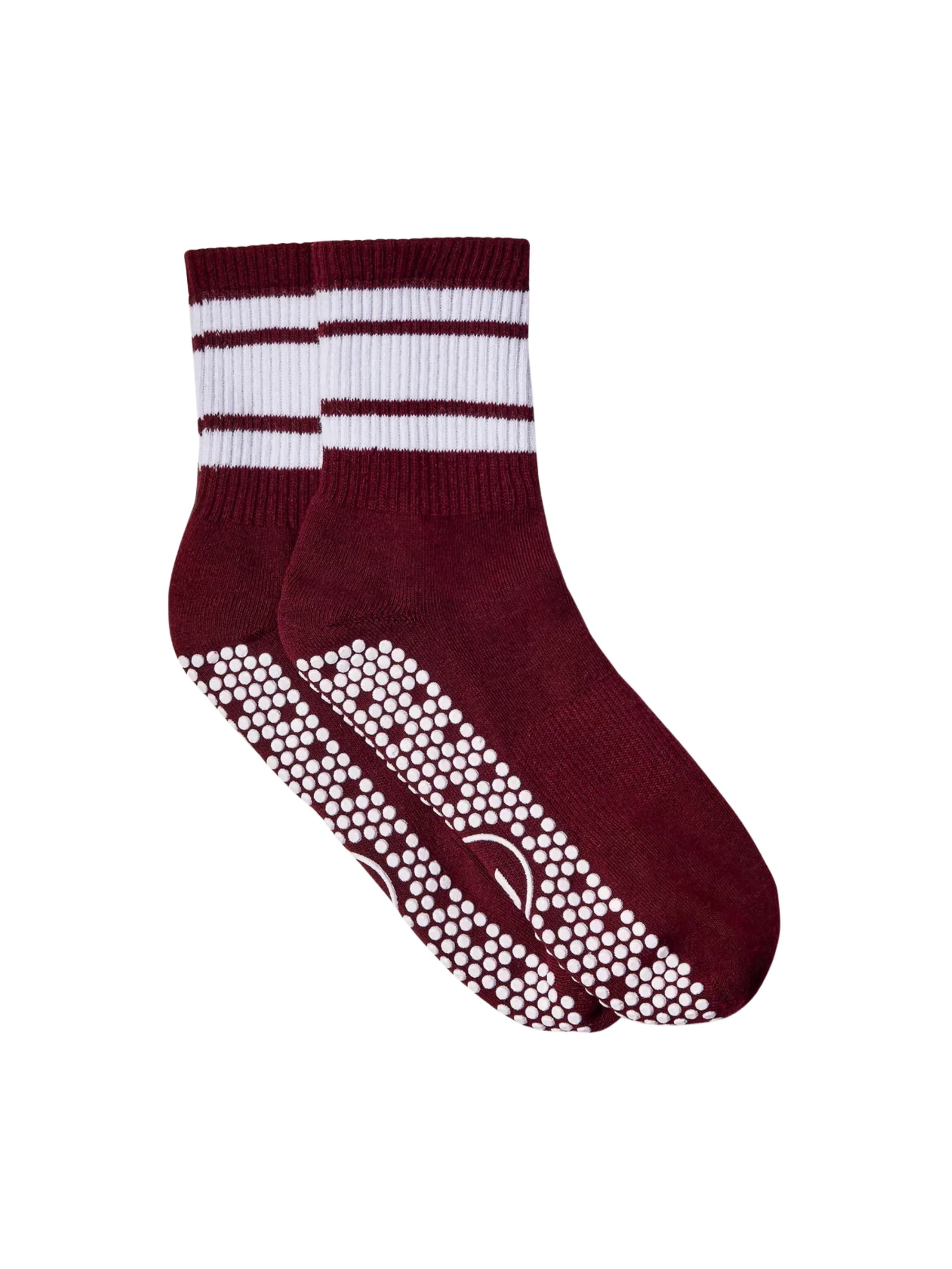 Maroon socks with white stripes and textured sole on a white background