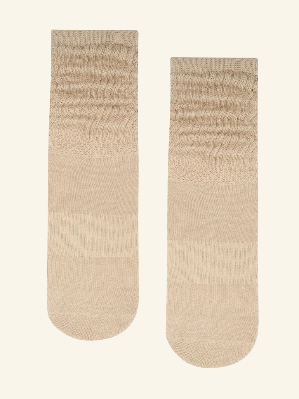 Pair of beige socks on a white background