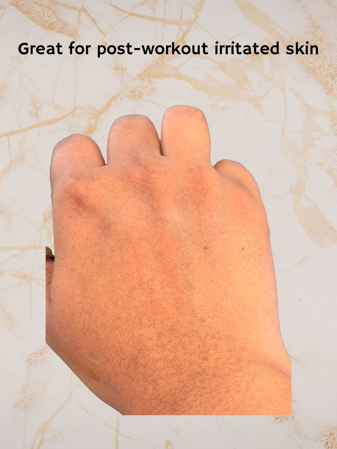A close-up of the back of a hand against a light marble-patterned background, with the text 'Great for post-workout irritated skin' above it.