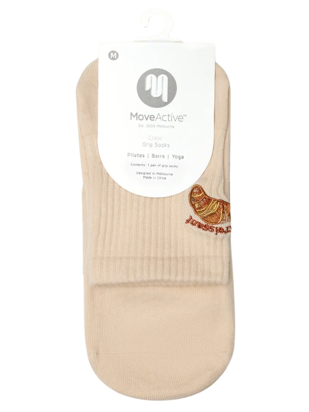 Beige ankle sock with a visible brand label on a white background