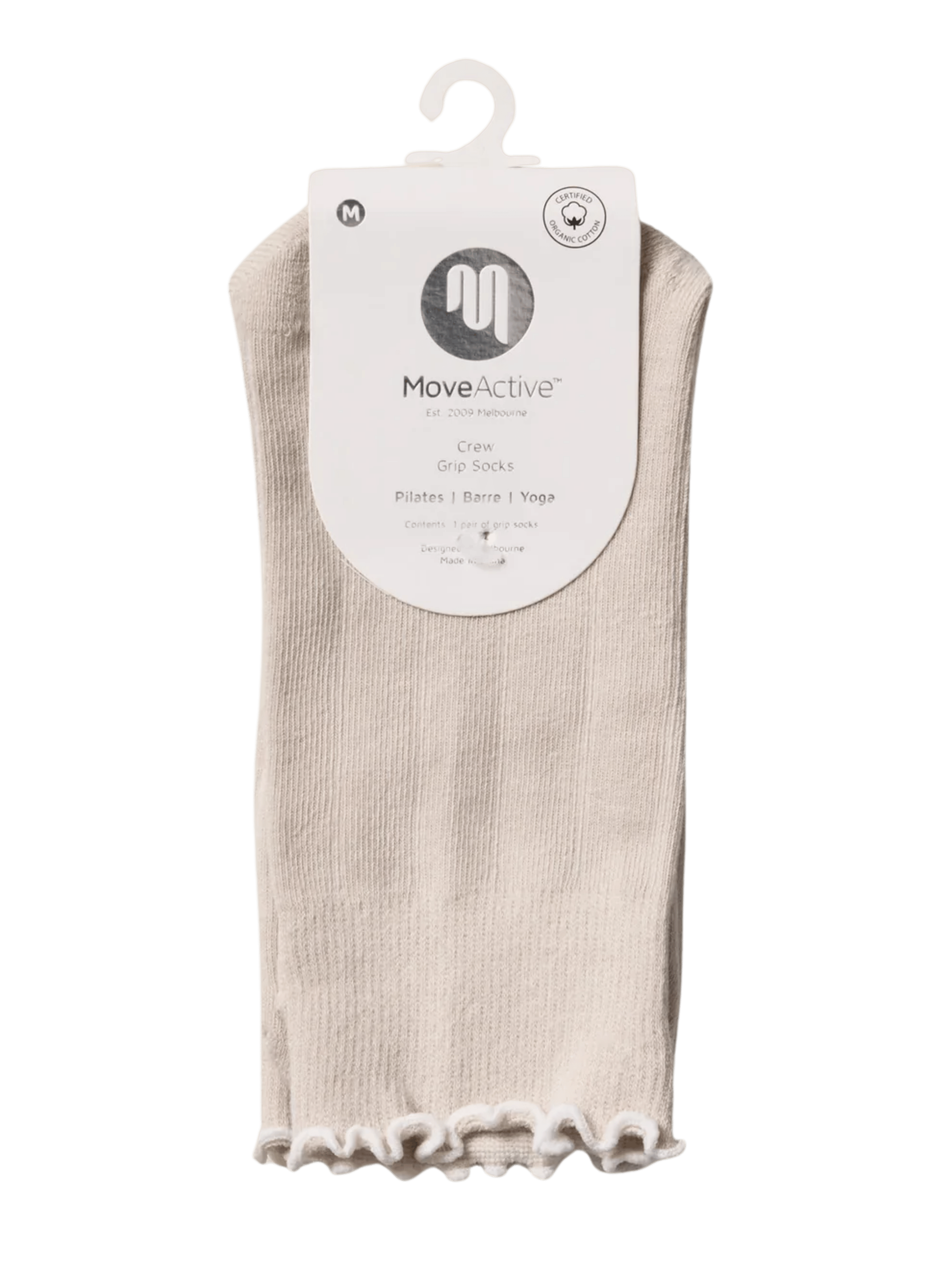 Beige ankle sock with white lace trim on a hanger against a green background