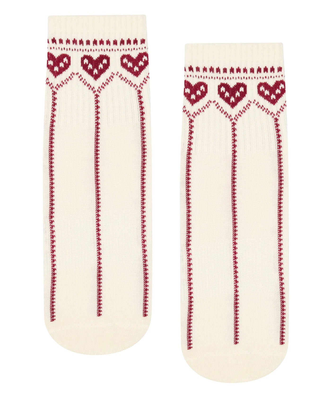 Pair of cream socks with red heart patterns on a white background